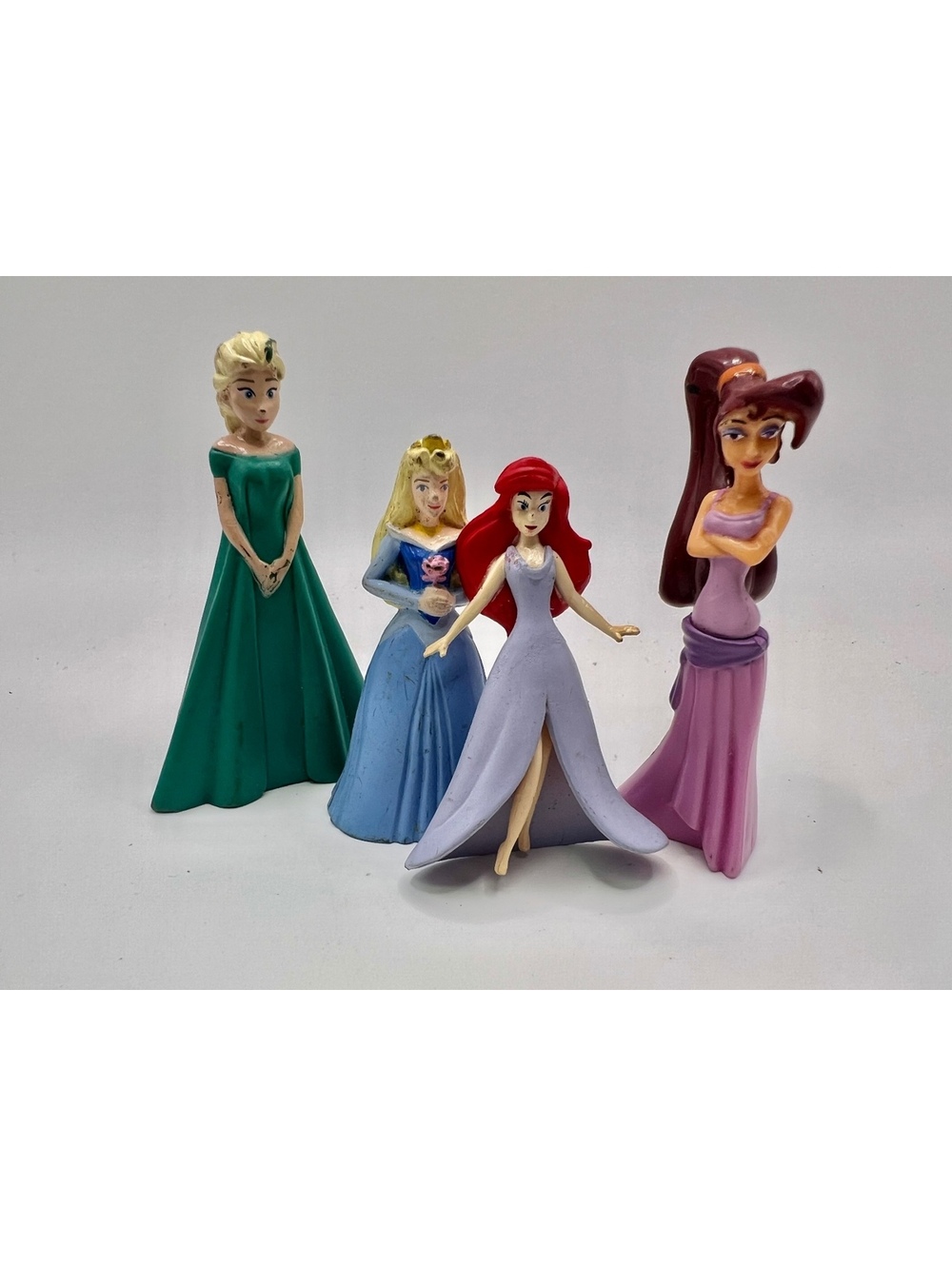 Set of 4 unique Disney Princesses figurines Rapunzel, Aurora, Ariel, and Megara